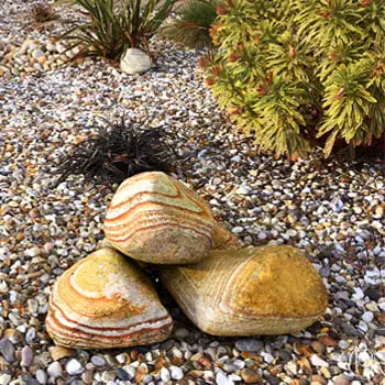 Decorative sandstone boulders in a rock garden