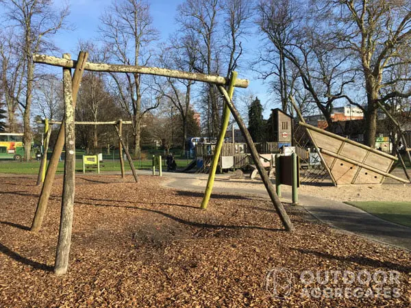  Wood chip play area with climbing frame