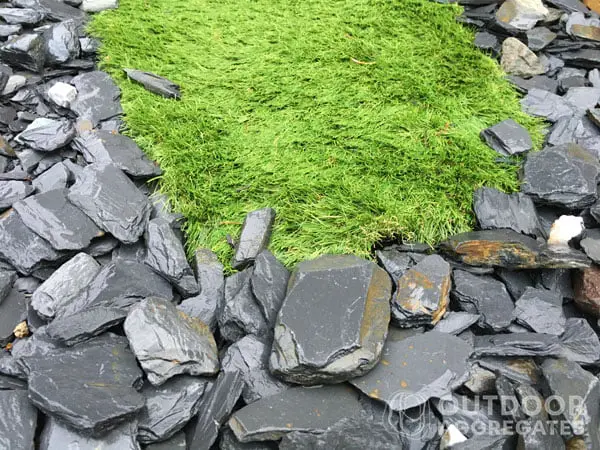  Grey slate chips and artificial lawn without garden border edging
