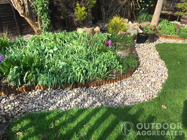  Rustic wood seperating lawn and garden path